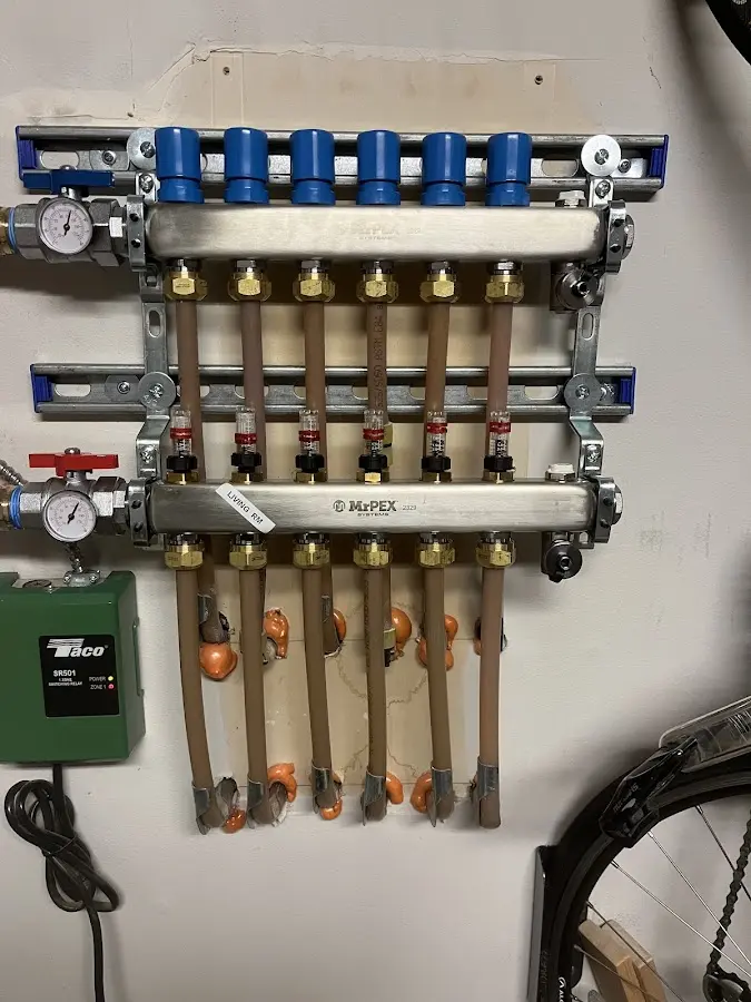 Plumber performing Water Heater Repair at a residential property in La Feria